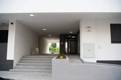 an empty hallway with stairs in a building at Harmony Space Apartment in Banja Luka