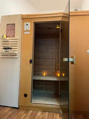 a glass door with a window in a room at VILLA M Rustic & Spa in Slatina Varoš