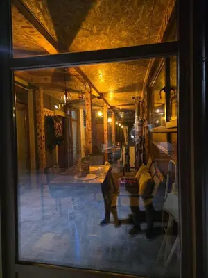 a view of a living room from a window at Apartmani Planinsko srce Vlašić in Vlasic