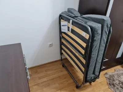 a luggage cart sitting in the corner of a room at HG3 Jelah Stan na Dan in Jelah