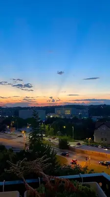 a view of a parking lot at sunset at Amina in Tuzla