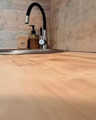 a kitchen with a sink and a counter top at Apartman Maximus in Kupres