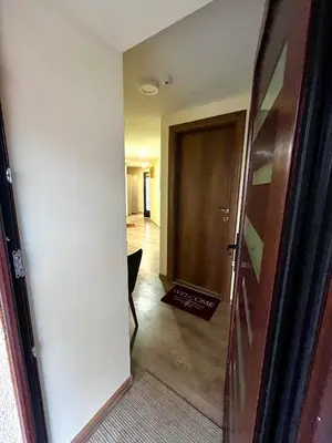 an open door to a room with a hallway at Vila Dvorište in Banja Luka