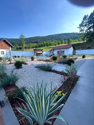 a garden with plants and a walkway at Romantic Lodge in Banja Luka
