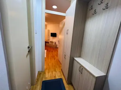 a hallway with a hallway leading to a room at Apartman Stefan in Banja Luka