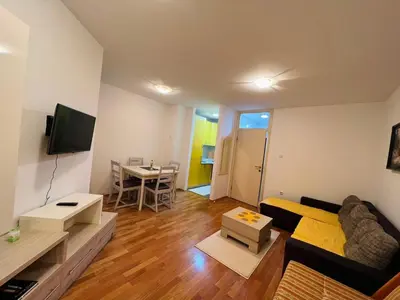 a living room with a couch and a table at Apartman Stefan in Banja Luka