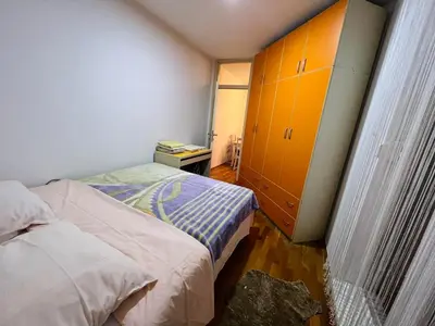 a bedroom with two beds and a dresser at Apartman Stefan in Banja Luka