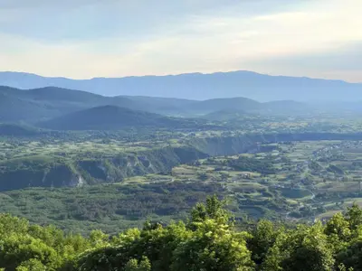 a view of a valley with mountains in the distance at UNA RESORT in Bosanska Krupa