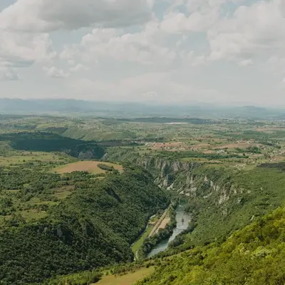 an aerial view of a river in a valley at UNA RESORT in Bosanska Krupa