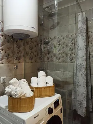 two baskets of towels on a counter in a bathroom at Apartman Obala in Bosanska Gradiška