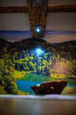 a view of a lake from a window at Kuća za odmor Mali raj-Kupres in Kupres