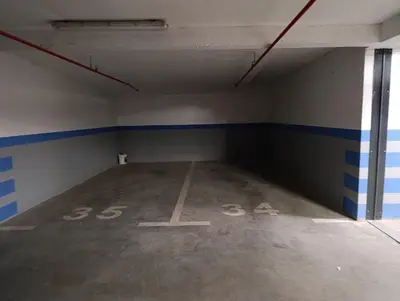 an empty room withpainted numbers on the floor at Apartman Bjanka in Banja Luka