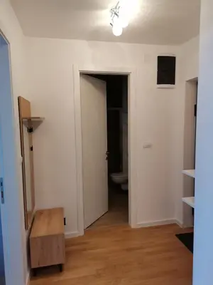 an empty room with a toilet and a door at Apartment Banja Luka in Banja Luka