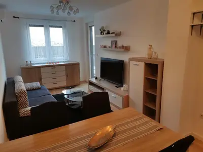 a living room with a couch and a table at Apartment Banja Luka in Banja Luka