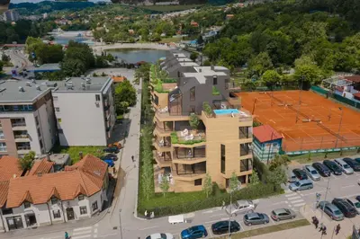 an overhead view of a city with buildings and a street at Panonika Tuzla in Tuzla