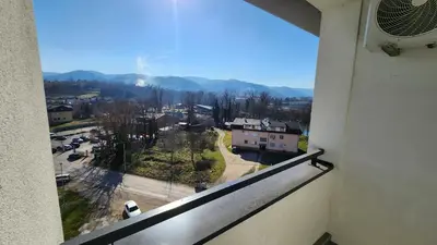 a view of a city from a balcony of a building at Ada Nostra in Banja Luka