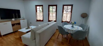 a living room with a couch and a table at Villa Ruža Vareš in Vareš
