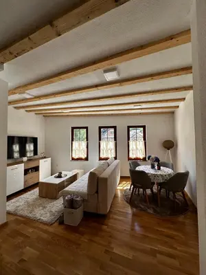 a living room with a couch and a table at Villa Ruža Vareš in Vareš