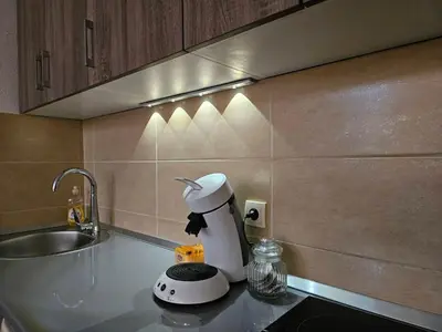 a kitchen counter with a blender on a counter top at Mrakovica 1 in Prijedor