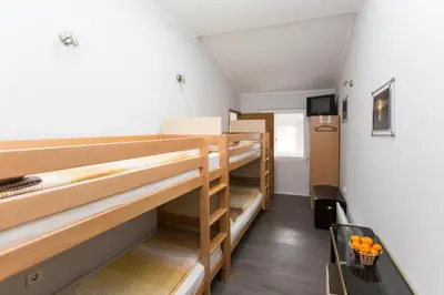 a room with two bunk beds in a room at Kingdom Rooms Visoko in Visoko