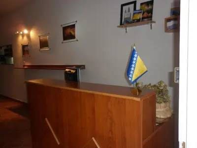 a wooden podium with a flag on top of it at Kingdom Rooms Visoko in Visoko