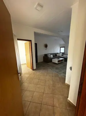 a view of a living room with a couch at Milincic‘s 2 Zimmerwohnung in Banja Luka