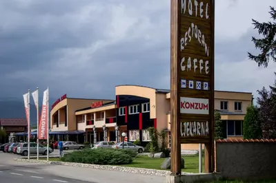 a sign for a hotel in front of a street at Motel Dani in Nova Bila