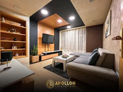 a living room with a couch and a tv at Stan na dan Apollon Doboj in Doboj