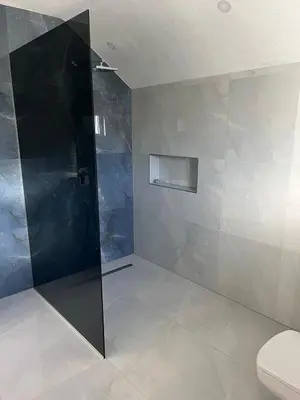 a bathroom with a shower and a toilet at BORIĆI in Bihać