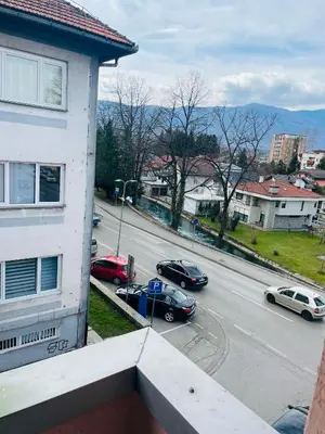 a view of a city street with cars on the road at Apartment Zara Bihac in Bihać