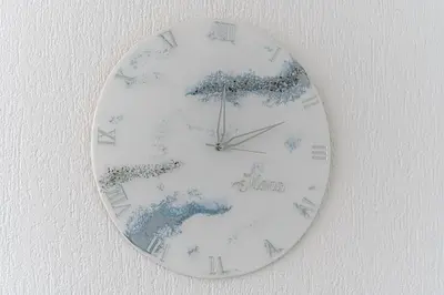 a clock is hanging on a wall at Mona Visoko in Visoko