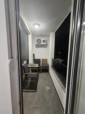 a room with a living room with a couch and a fireplace at Apartment Zidart Banja Luka free garage in Banja Luka
