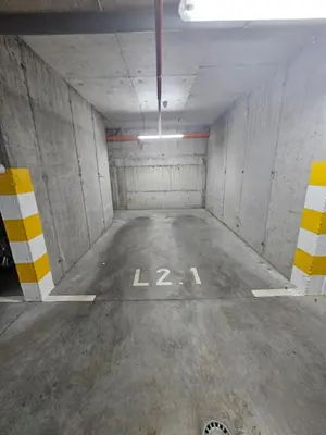 an empty parking lot in a parking garage at Apartment Zidart Banja Luka free garage in Banja Luka