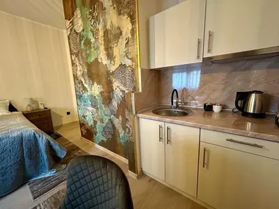 a kitchen with a sink and a counter top at AD BASANTE in Bosanski Šamac