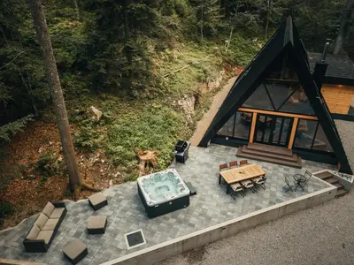 an overhead view of a house with a swimming pool at The Cozy Chalet in Bosanski Petrovac
