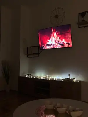 a living room with a flat screen tv on a wall at Stan 23 in Banja Luka