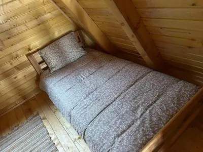 an overhead view of a bed in a cabin at Villa Forest Paradise in Visoko