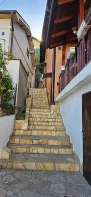 a set of stairs in front of a building at Sobe Amar in Tuzla