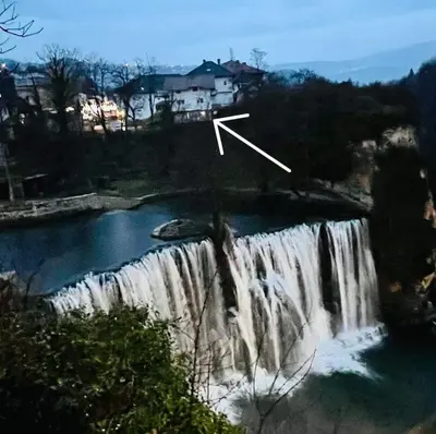 a picture of a waterfall with a x on it at Apartman Heli Meli 1 in Jajce