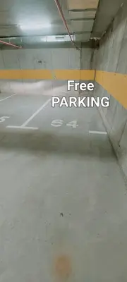 a parking garage with the words free parking written on it at Stan na dan Borik Banja Luka in Banja Luka