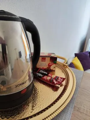 a toaster sitting on a table on a table at Apartman M&M in Travnik