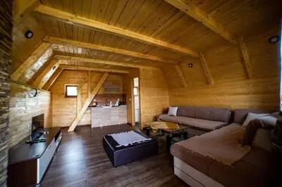 a living room with a couch and a table at Una Relax in Bosanski Novi