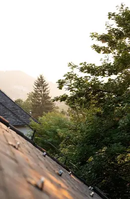 a view from the roof of a house with trees at Apartman Maja in Jajce