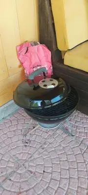 a table with a pink bag on top of it at Sole Tiny House in Šipovo