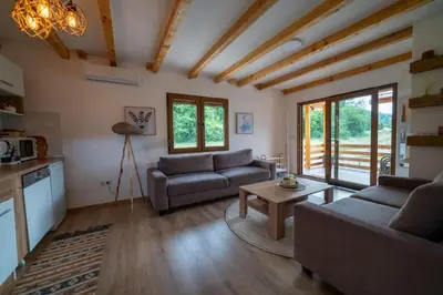 a living room with two couches and a table at Sweet Home Visoko FREE PARKING, AC, RENT A CAR in Visoko