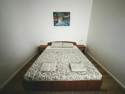 a bedroom with two beds in a room at Apartman Zdravko in Tomislavgrad