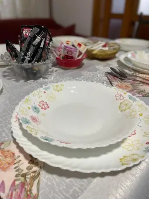 a white plate sitting on top of a table at Apartment Old Town Visoko in Visoko