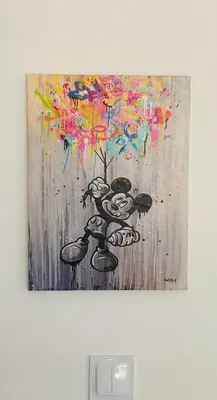 a painting hanging on a wall with a painting at Happy Dreams Oasis Cazin, Modernes Apartment 60m2, WiFi & Balkon in Cazin