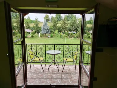 a view of a patio with a table and chairs at Resort Čokori in Banja Luka