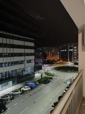 a view of a city street at night at Apartman Amabilis in Banja Luka